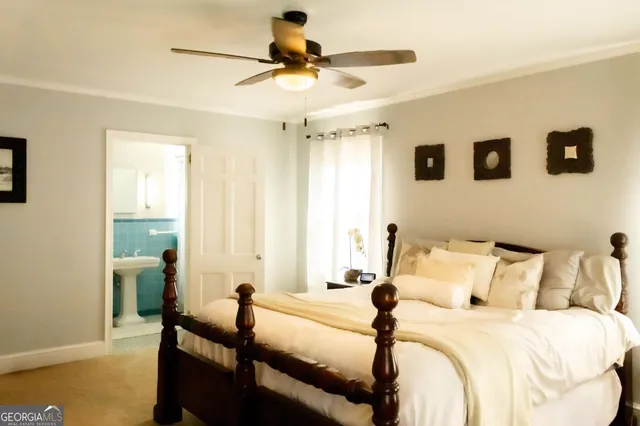 a bedroom with a bed and a table