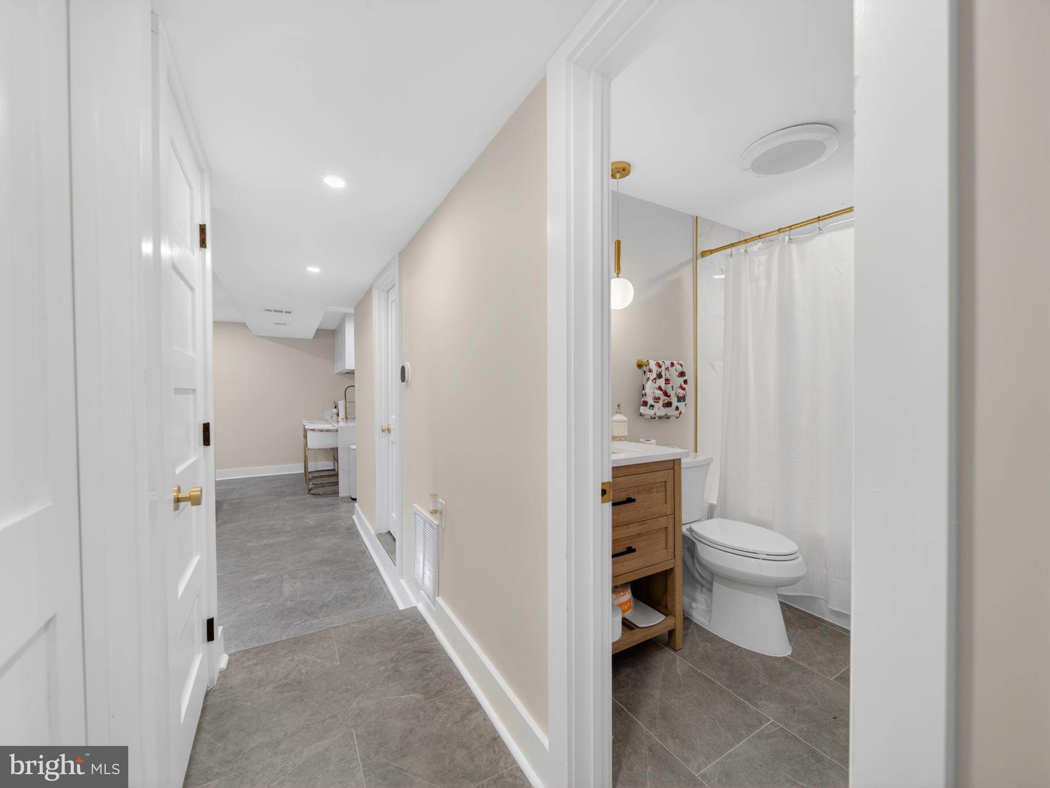 13427 Delaney Road Woodbridge, VA 22193 - Photo 36 of 57 a bathroom with a sink and a toilet