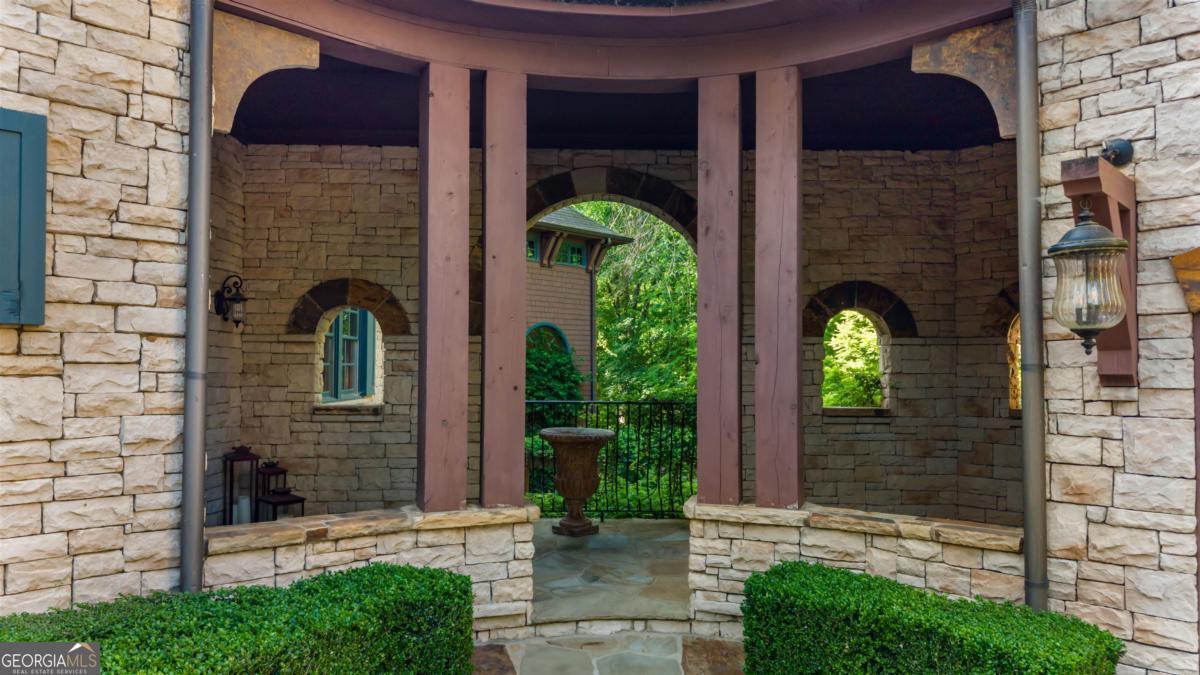 1090 Spring Creek Greensboro, GA 30642 - Photo 18 of 75 a front view of a house with garden