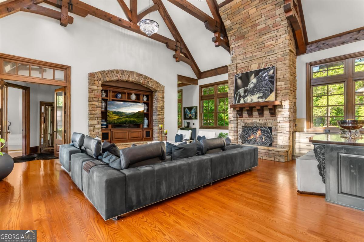 1090 Spring Creek Greensboro, GA 30642 - Photo 24 of 75 a living room with furniture and a large window