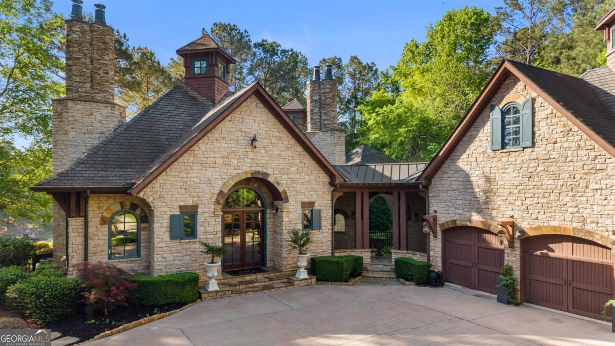 1090 Spring Creek Greensboro, GA 30642 - Photo 5 of 75 a view of a house with garden and plants