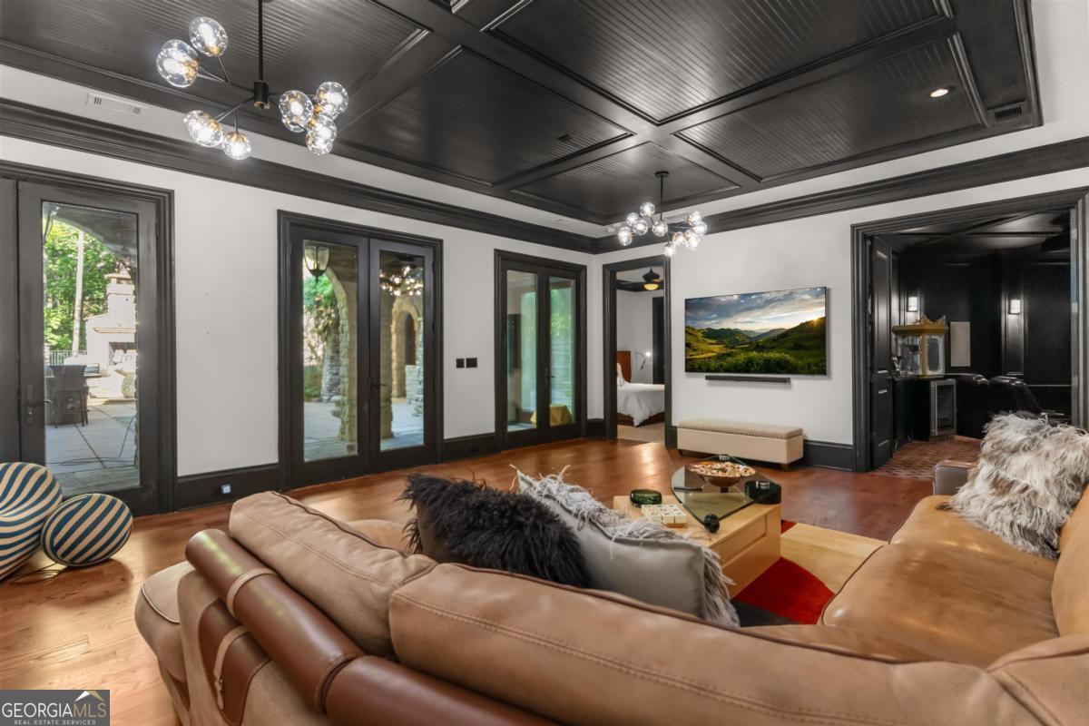 1090 Spring Creek Greensboro, GA 30642 - Photo 57 of 75 a living room with furniture and a large window