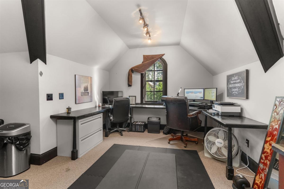 1090 Spring Creek Greensboro, GA 30642 - Photo 71 of 75 a view of a workspace with furniture and a window