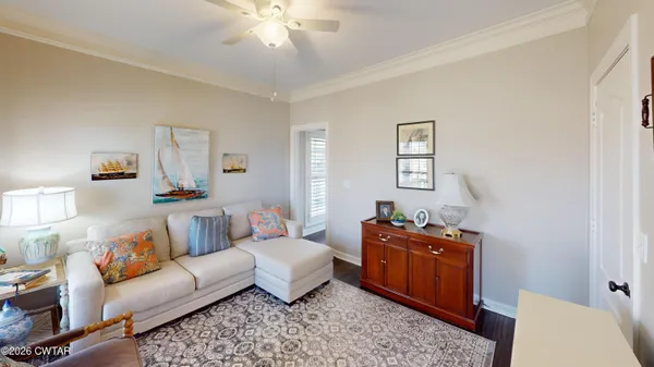 a living room with furniture and window