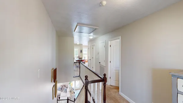 a view of entryway with stairs