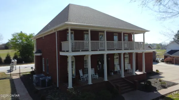a front view of a house with glass windows