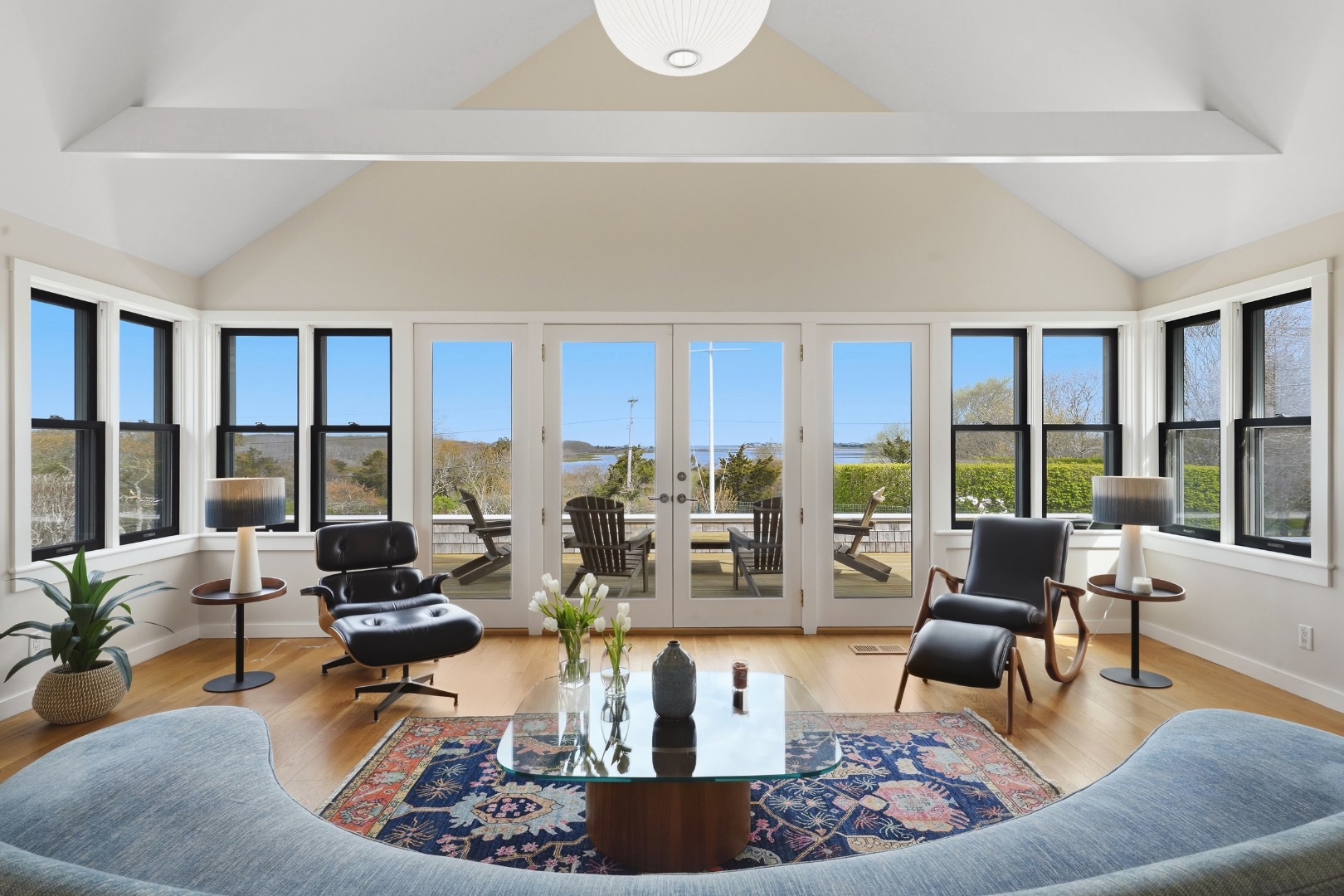 247 Polpis Road Nantucket, MA 02554 - Photo 6 of 52 a living room with furniture large windows and wooden floor