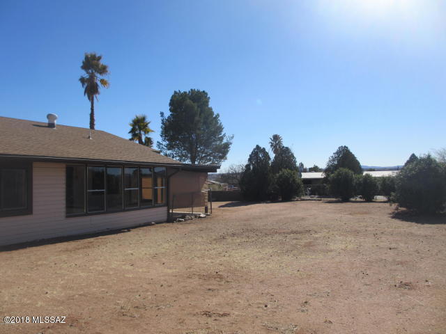1160 Avenida Leon Rio Rico, AZ 85648 - Photo 40 of 47 a view of a house with a snow in the yard