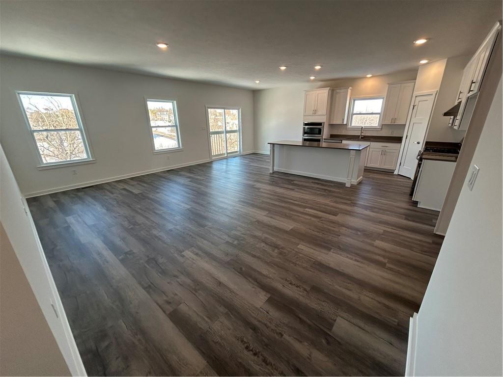203 Lola Court McKees Rocks, PA 15136 - Photo 11 of 23 a view of a kitchen with cabinets and wooden floor