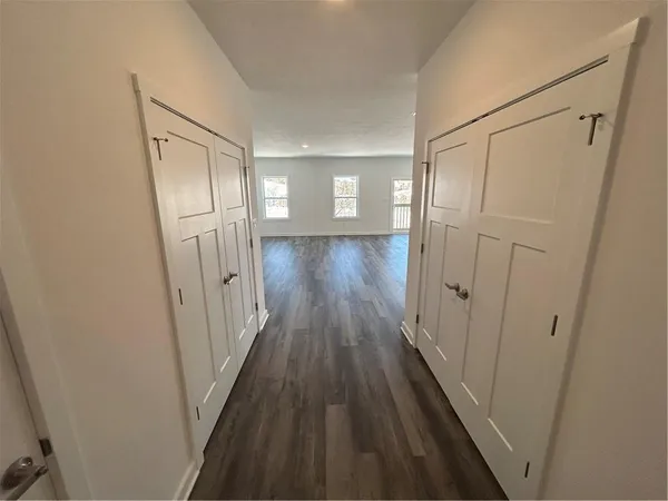 a view of kitchen with wooden floor