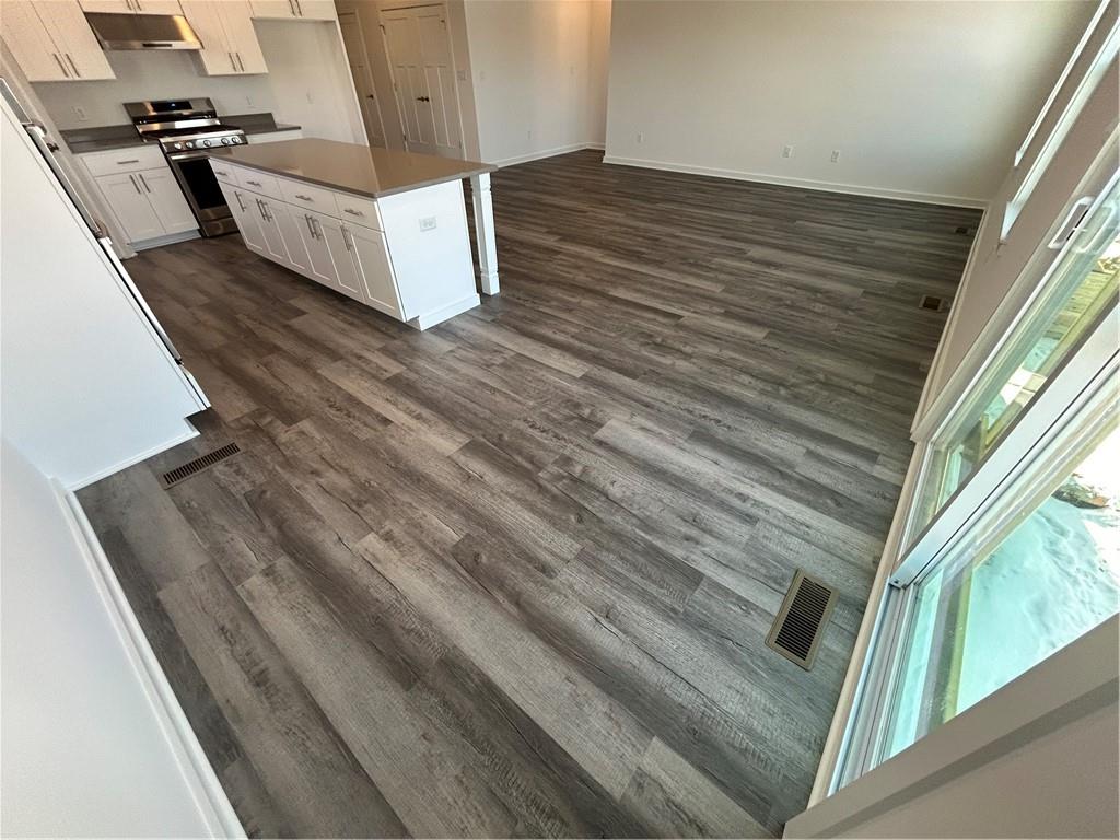 203 Lola Court McKees Rocks, PA 15136 - Photo 14 of 23 a view of a living room with a wooden floor