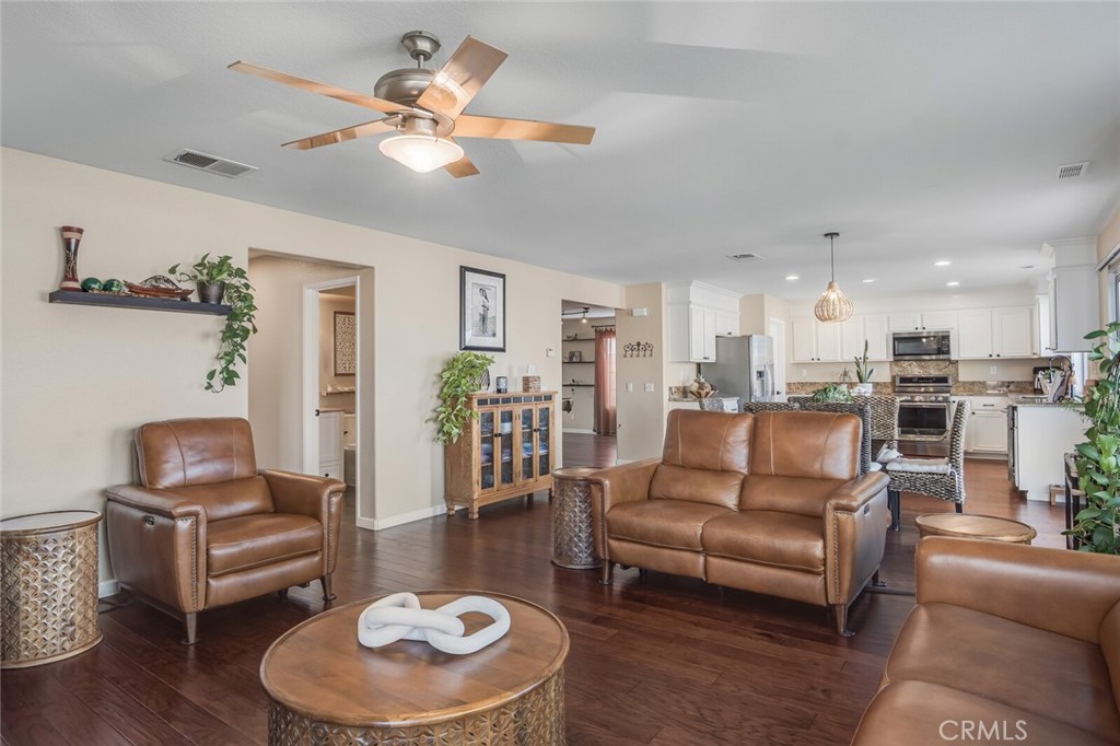 In the gated community of River Ranch, this home doesn’t just show up, it makes an entrance.