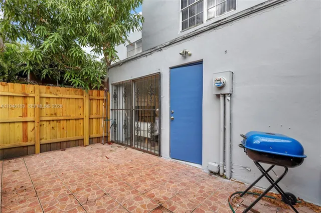 a view of a backyard of a house