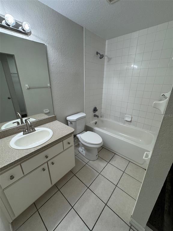 11322 Southeast 55th Avenue Road, Unit 1301 Belleview, FL 34420 - Photo 13 of 20 a bathroom with a double vanity sink mirror and toilet