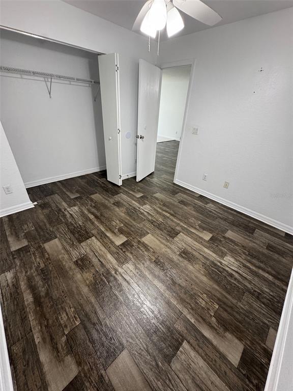 11322 Southeast 55th Avenue Road, Unit 1301 Belleview, FL 34420 - Photo 18 of 20 a view of a room with wooden floor
