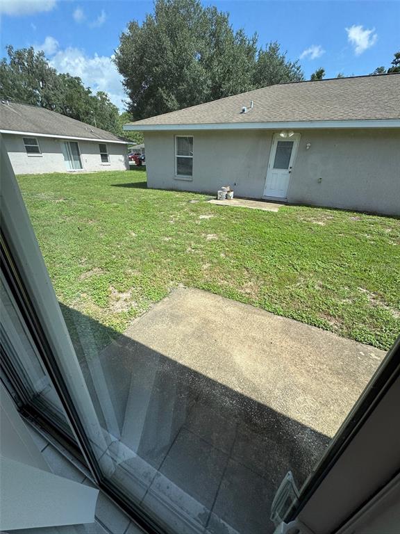 11322 Southeast 55th Avenue Road, Unit 1301 Belleview, FL 34420 - Photo 20 of 20 a view of outdoor space