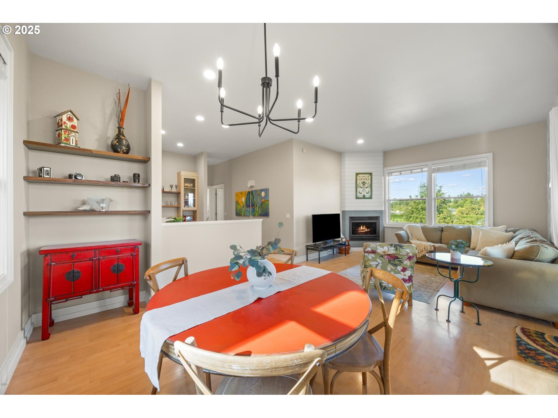 800 Rosemont Road West Linn, OR 97068 - Photo 28 of 48 a living room with furniture a fireplace and a large window