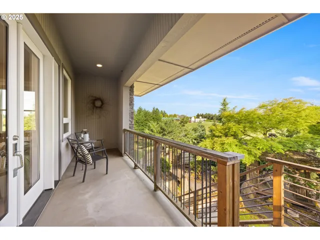 a balcony with chairs