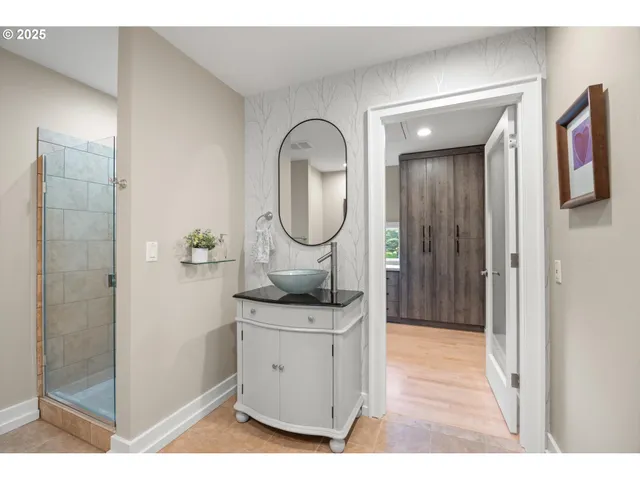a view of a bathroom sink and a mirror