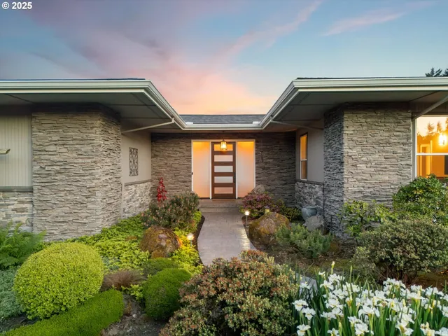 a house with trees in front of it