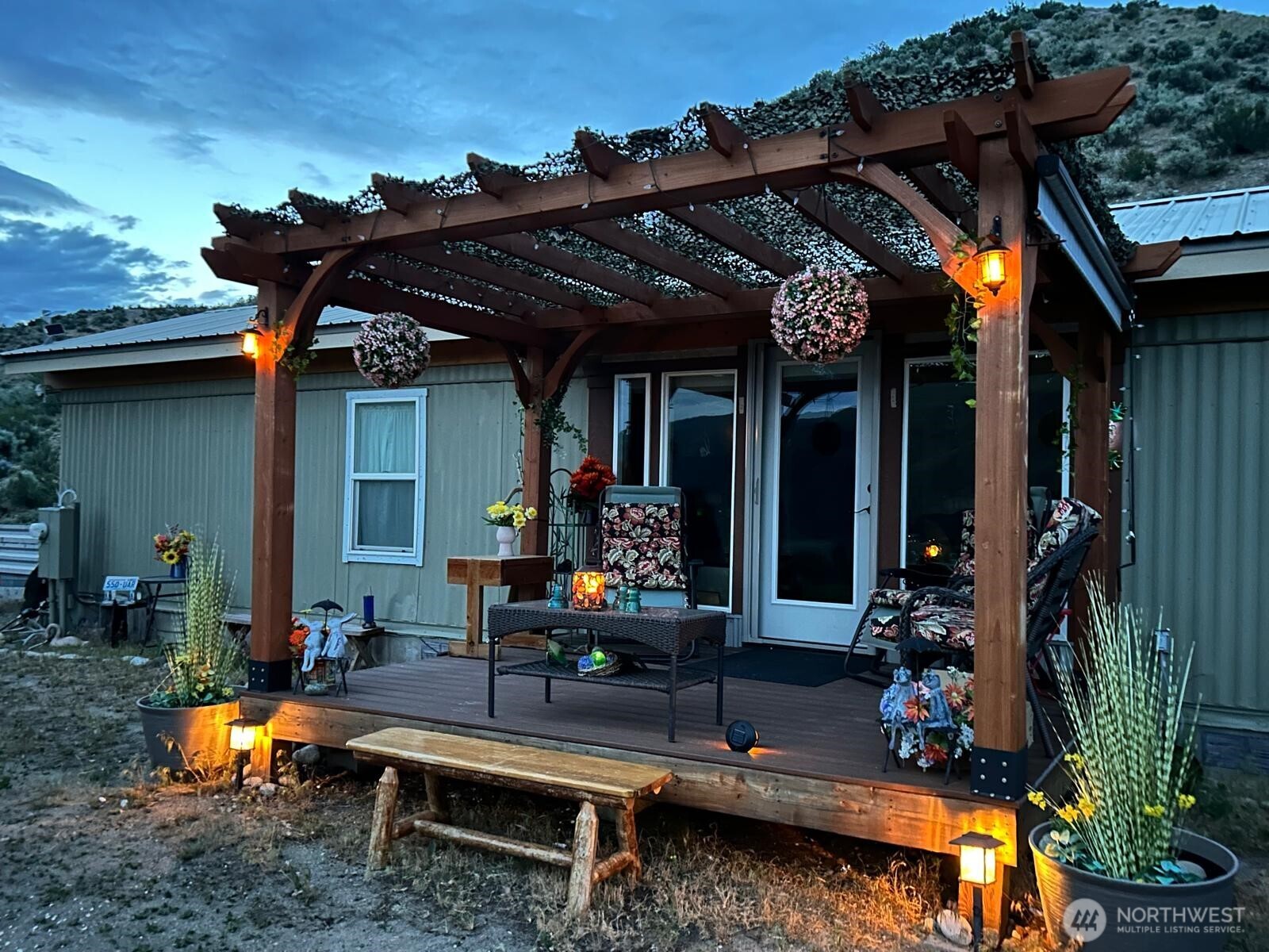 14 Bridgeview Road Tonasket, WA 98855 - Photo 11 of 28 a view of a chairs and tables in patio