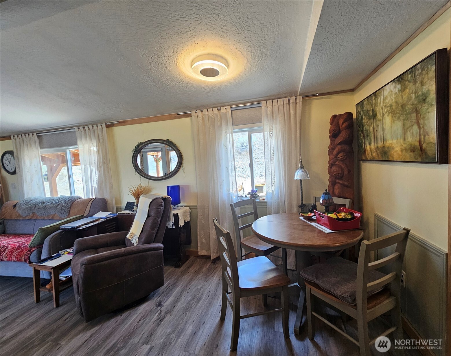 14 Bridgeview Road Tonasket, WA 98855 - Photo 16 of 32 a living room with furniture and wooden floor