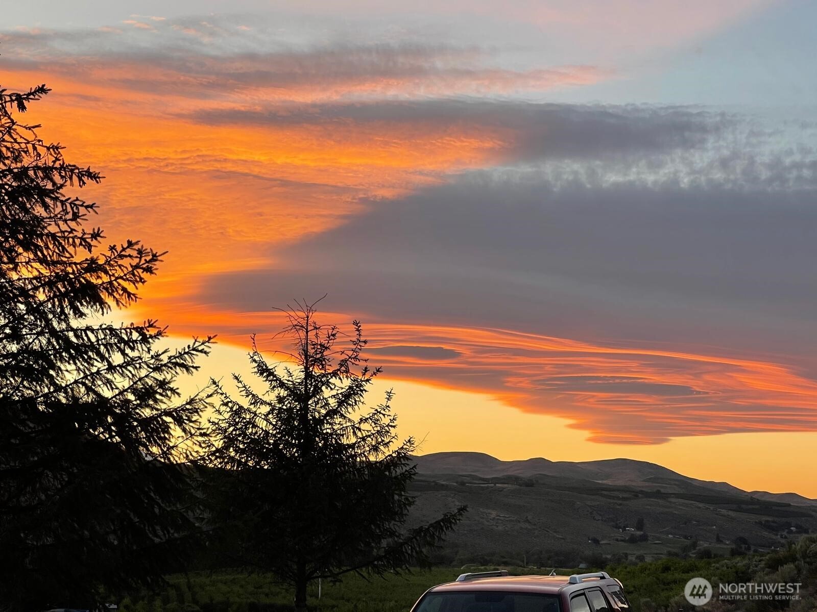 14 Bridgeview Road Tonasket, WA 98855 - Photo 21 of 28 a view of mountain with sunset