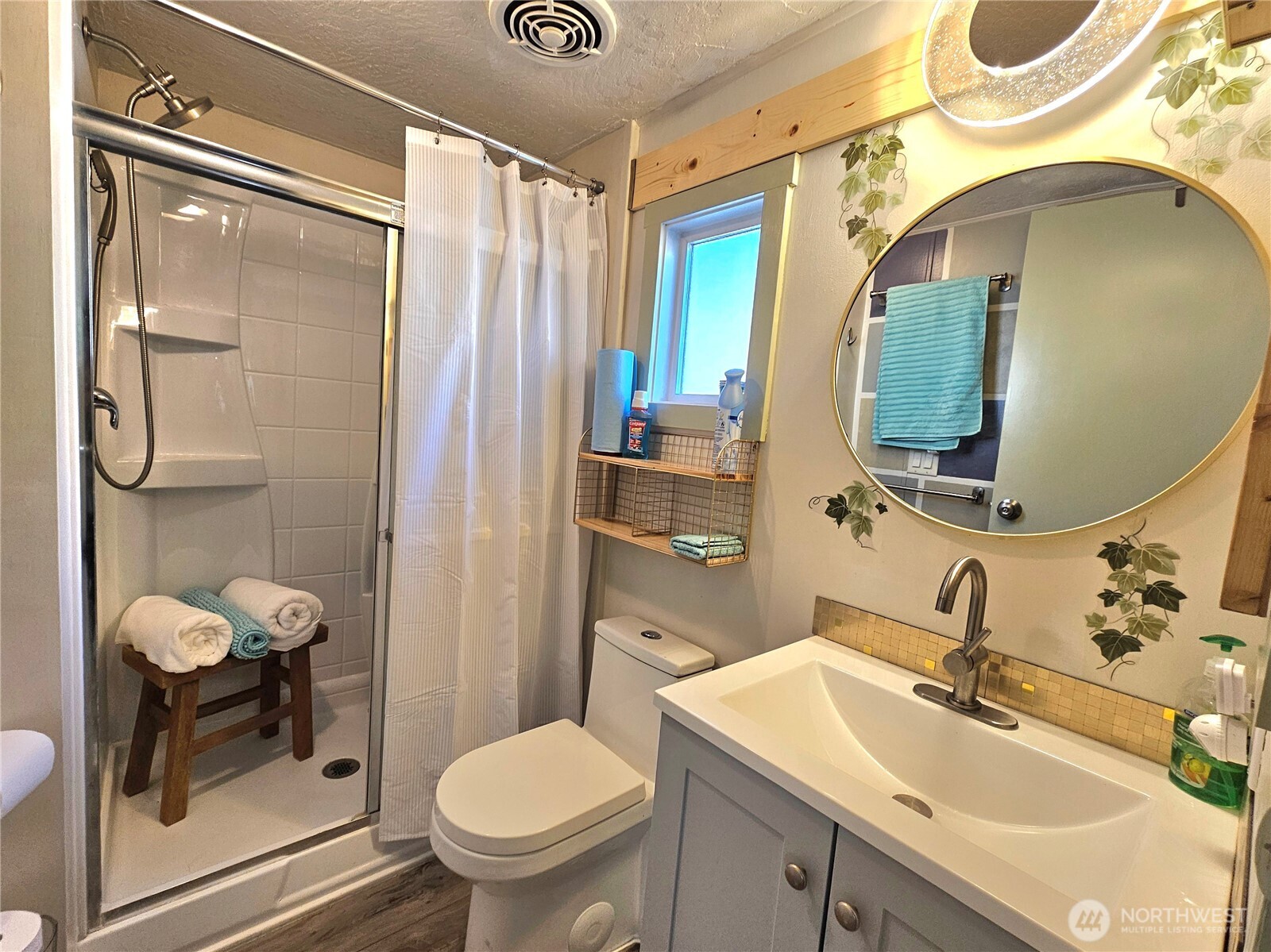 14 Bridgeview Road Tonasket, WA 98855 - Photo 22 of 32 a bathroom with a sink toilet and shower