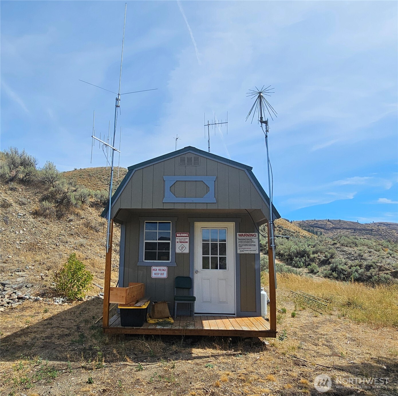 14 Bridgeview Road Tonasket, WA 98855 - Photo 25 of 28 a front view of a house with a yard