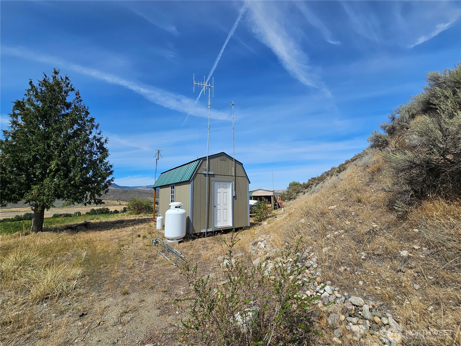 14 Bridgeview Road Tonasket, WA 98855 - Photo 26 of 28 a view of a backyard of the house