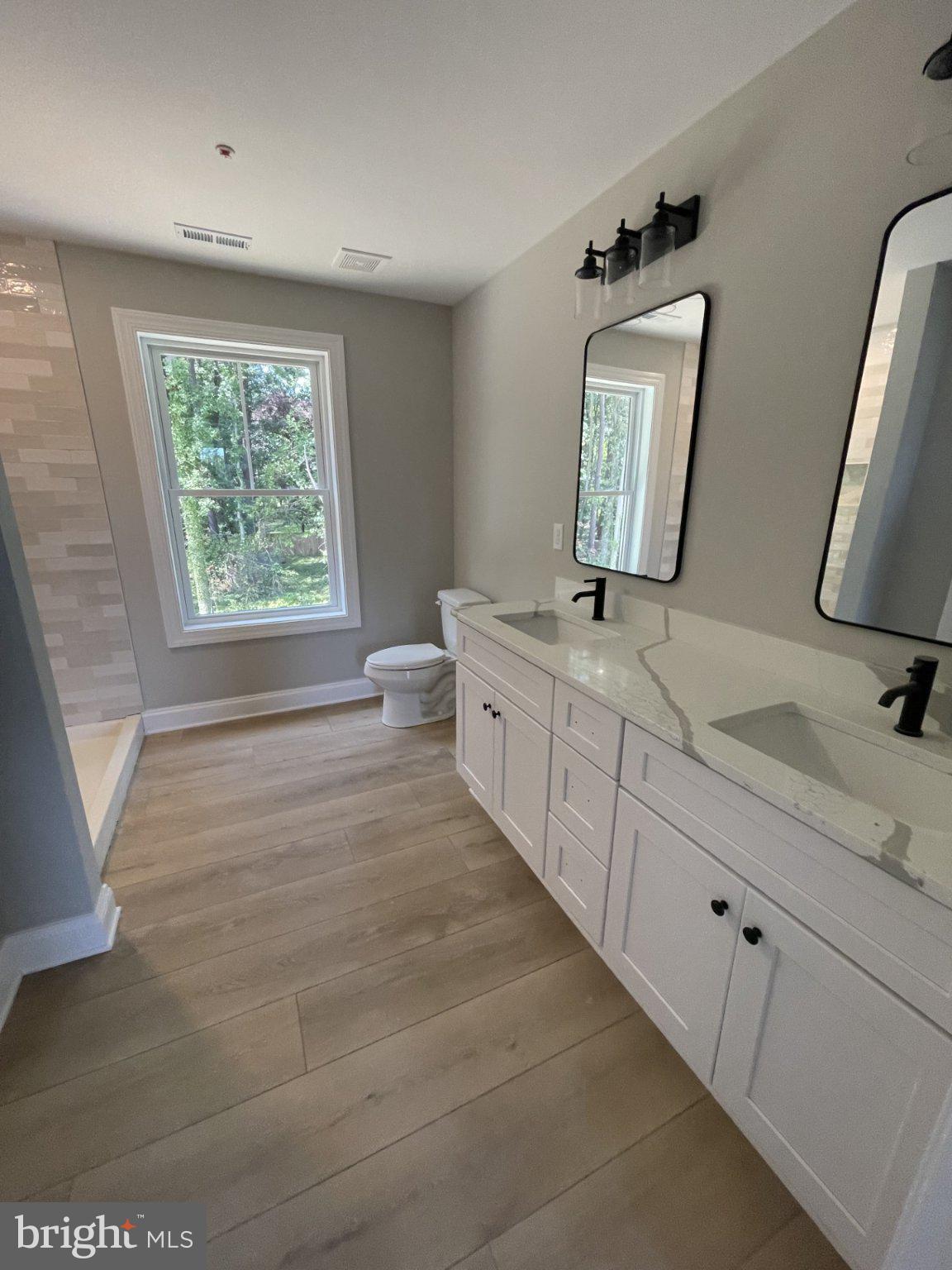 506 Talbot Road Stevensville, MD 21666 - Photo 21 of 30 Owners bath with double vanity and walk in shower.