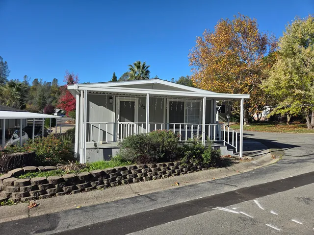 a view of a house with a garden