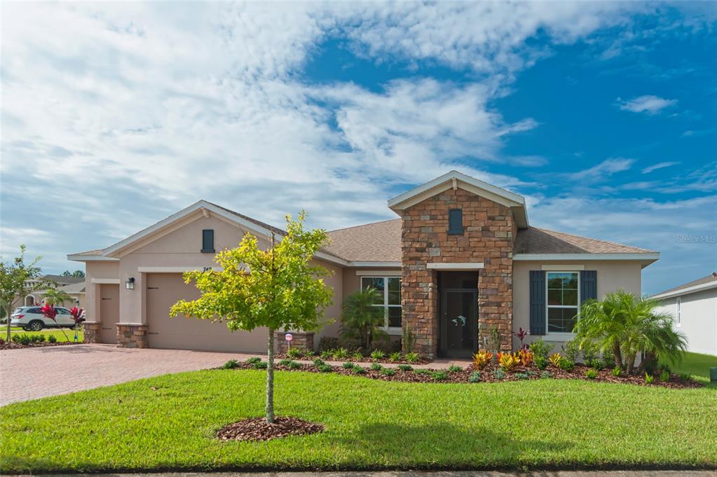749 Irvine Ranch Road Poinciana, FL 34759 - Photo 1 of 1 Impressive stone front Sorano model