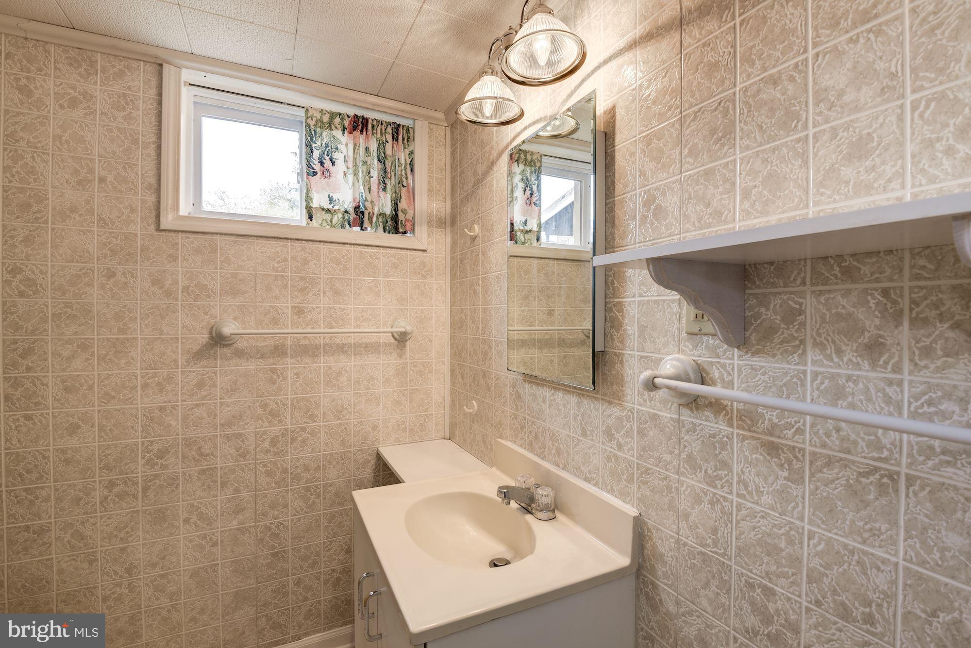 3516 Harrell Street Silver Spring, MD 20906 - Photo 23 of 35 Full Bath in lower level (shower to left)