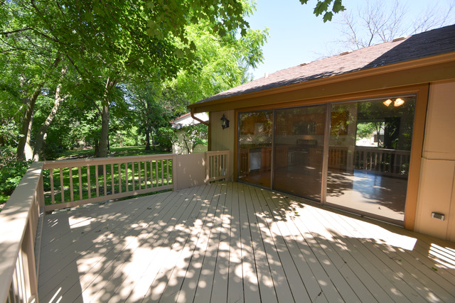 30W279 Ridgewood Court Warrenville, IL 60555 - Photo 19 of 23 a view of a back yard of the house and a yard