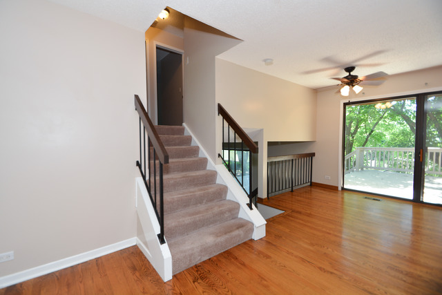 30W279 Ridgewood Court Warrenville, IL 60555 - Photo 8 of 23 a view of entryway and hall with wooden floor