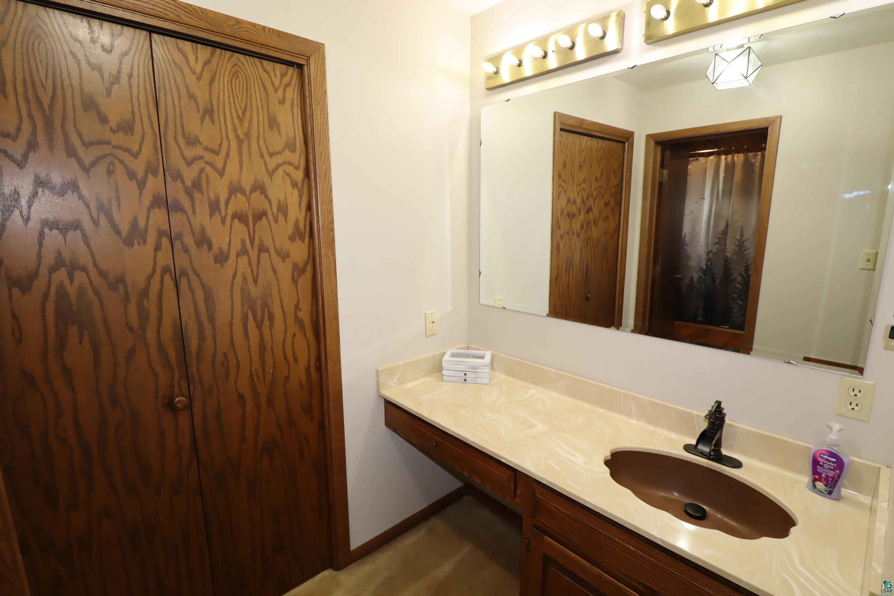 200 Maple Ridge Ashland, WI 54806 - Photo 25 of 40 Bathroom featuring large vanity