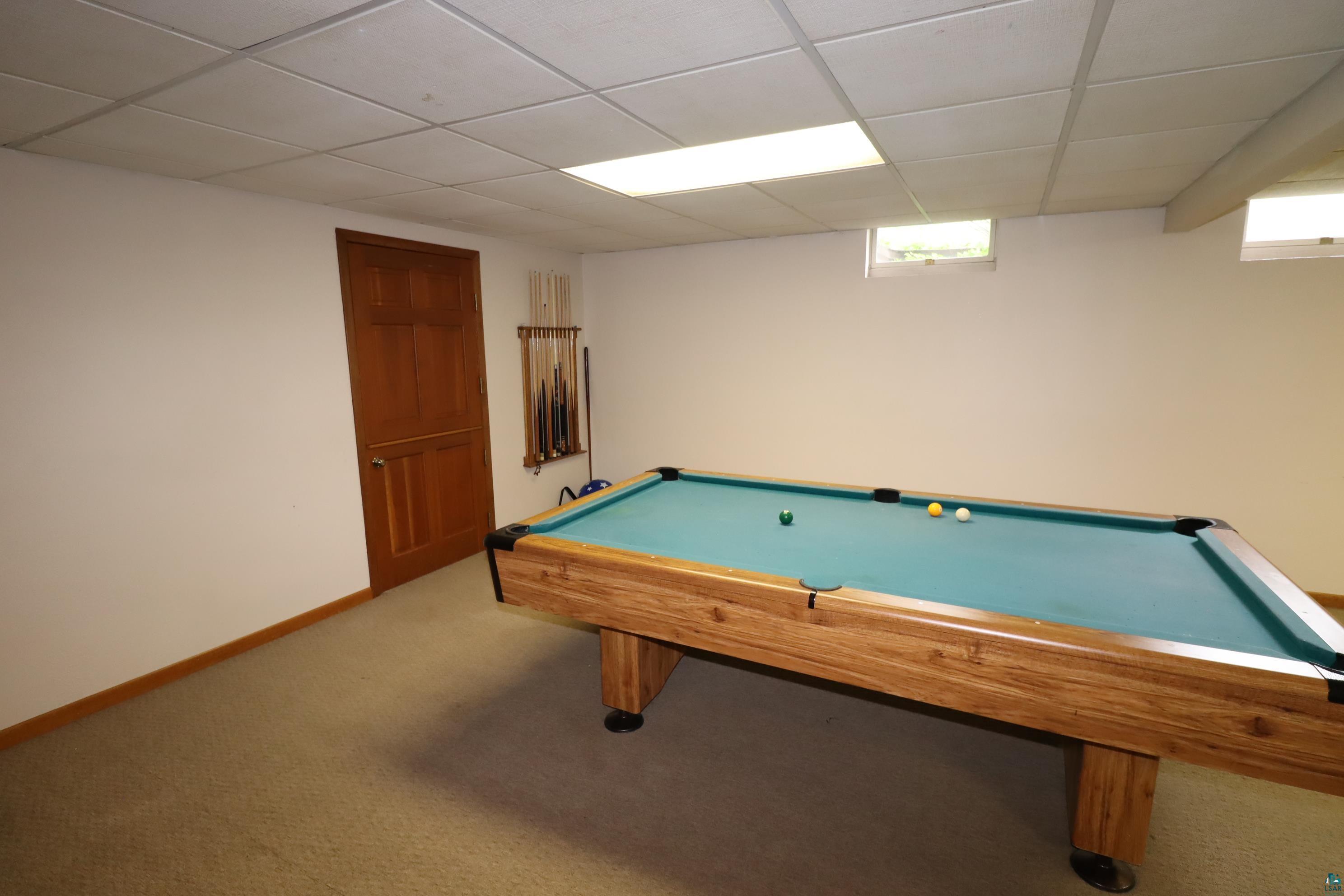 200 Maple Ridge Ashland, WI 54806 - Photo 34 of 40 Rec room with carpet flooring, a paneled ceiling, and pool table