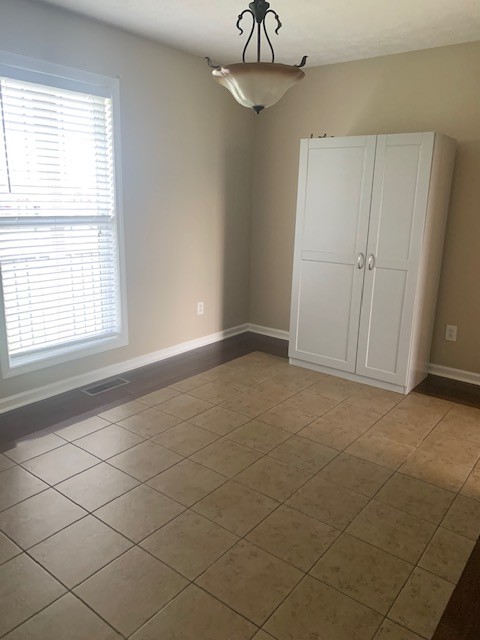 429 Fowler Ford Road Portland, TN 37148 - Photo 2 of 12 a view of an empty room with a window