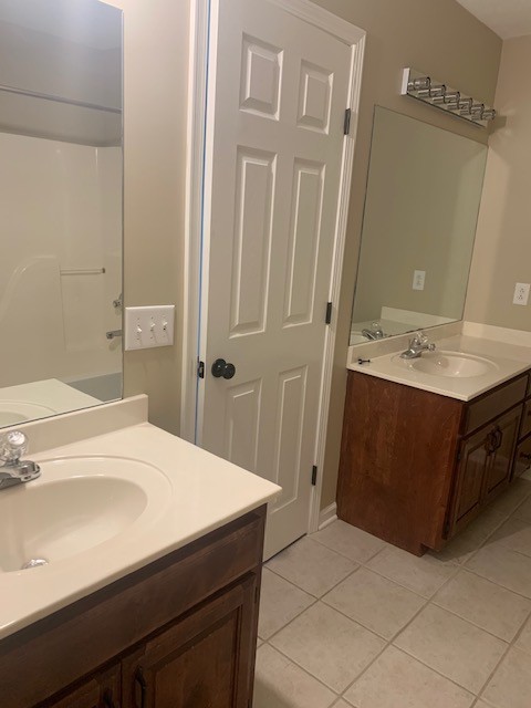429 Fowler Ford Road Portland, TN 37148 - Photo 12 of 12 a bathroom with a sink a toilet and shower