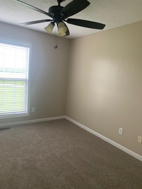 429 Fowler Ford Road Portland, TN 37148 - Photo 6 of 12 a view of an empty room with a window