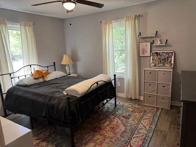 a bedroom with a bed and a closet