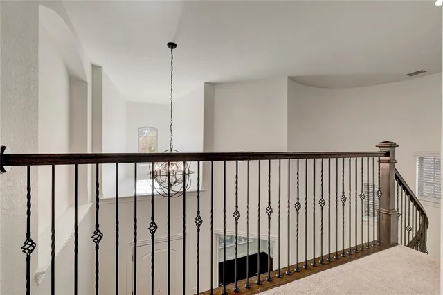 a view of room with a ceiling fan