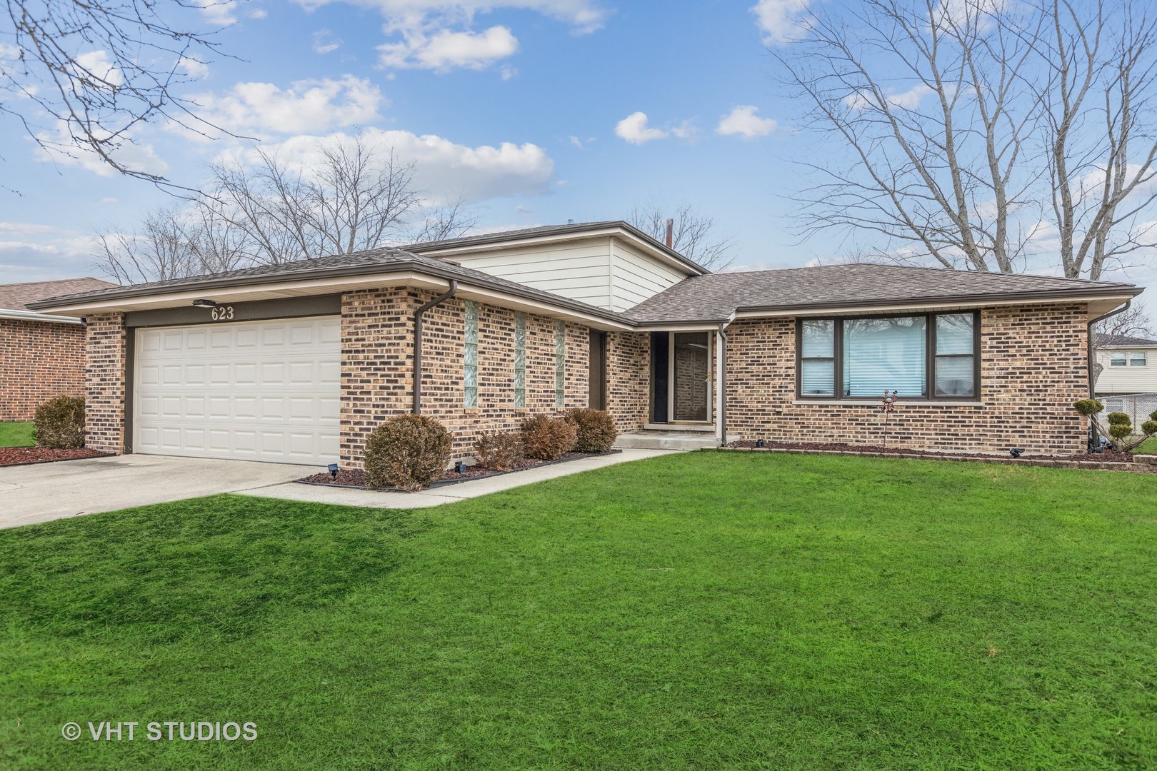 623 Quail Run Road Matteson, IL 60443 - Photo 1 of 16 a view of a house with a backyard