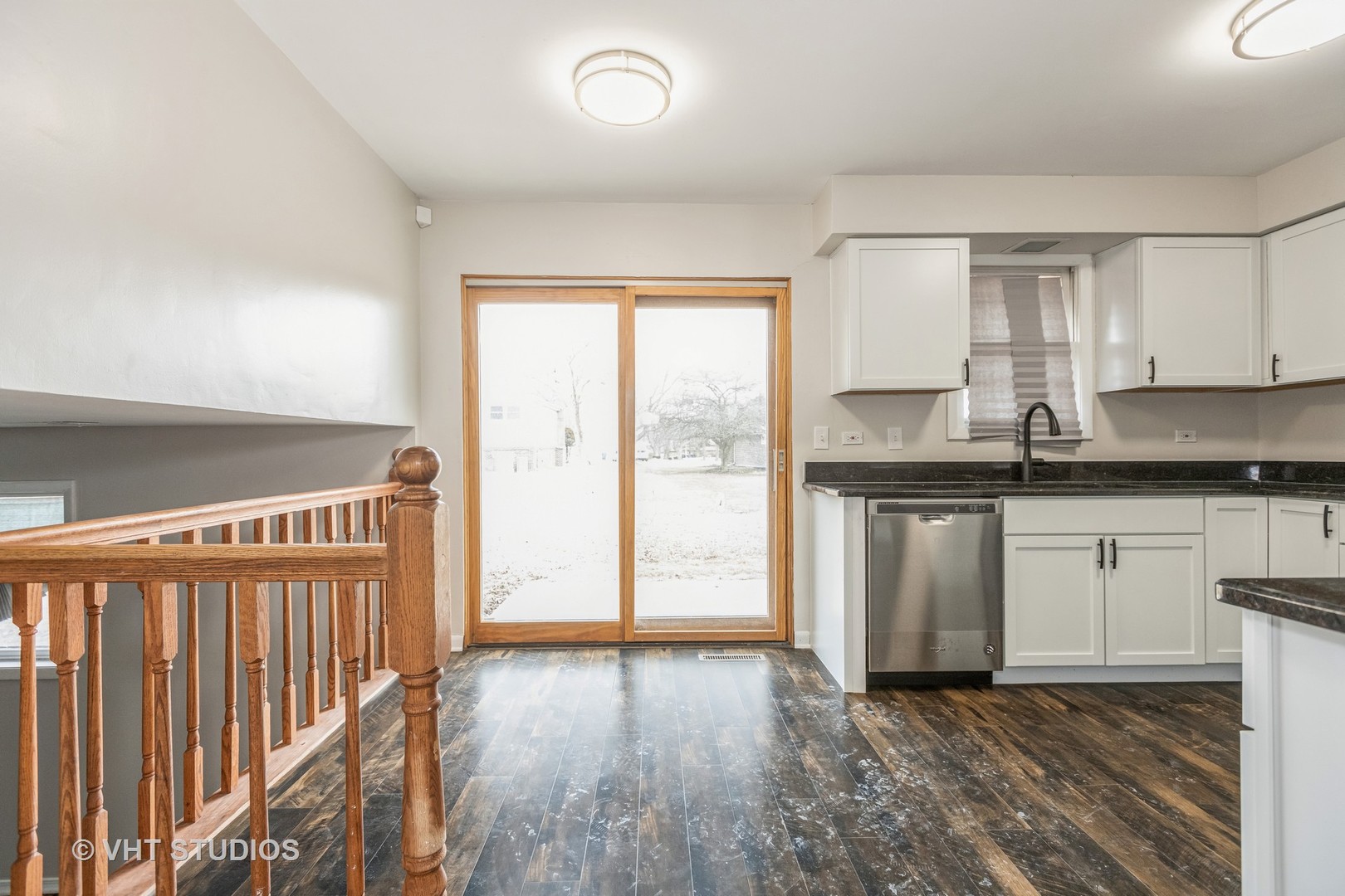 623 Quail Run Road Matteson, IL 60443 - Photo 4 of 16 a kitchen with granite countertop a sink and a stove top oven
