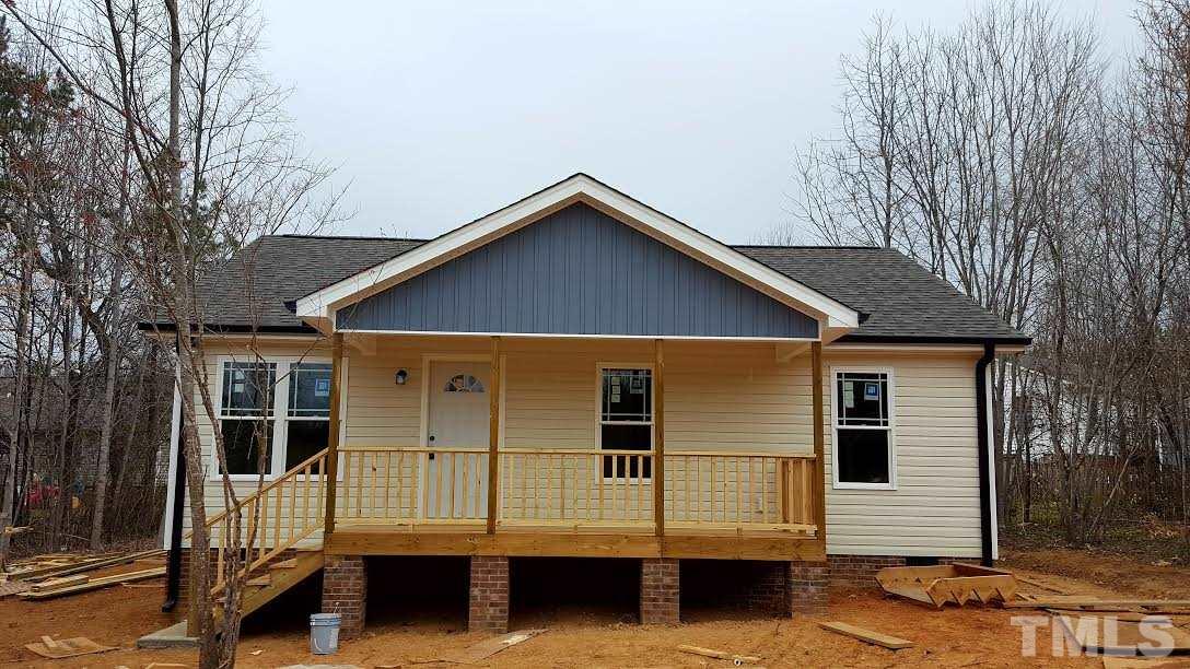 37 Eli Court Roxboro, NC 27573 - Photo 2 of 13 a view of a house with a yard