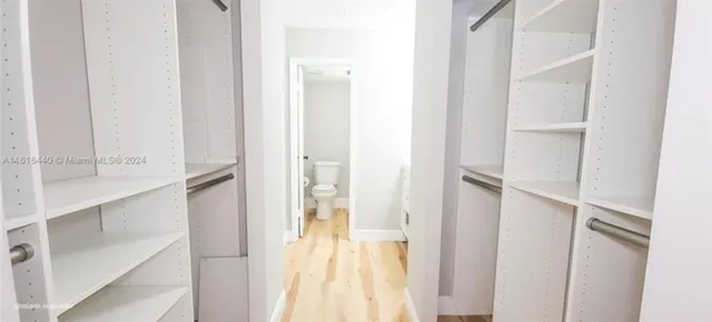 a view of a bathroom with a white door