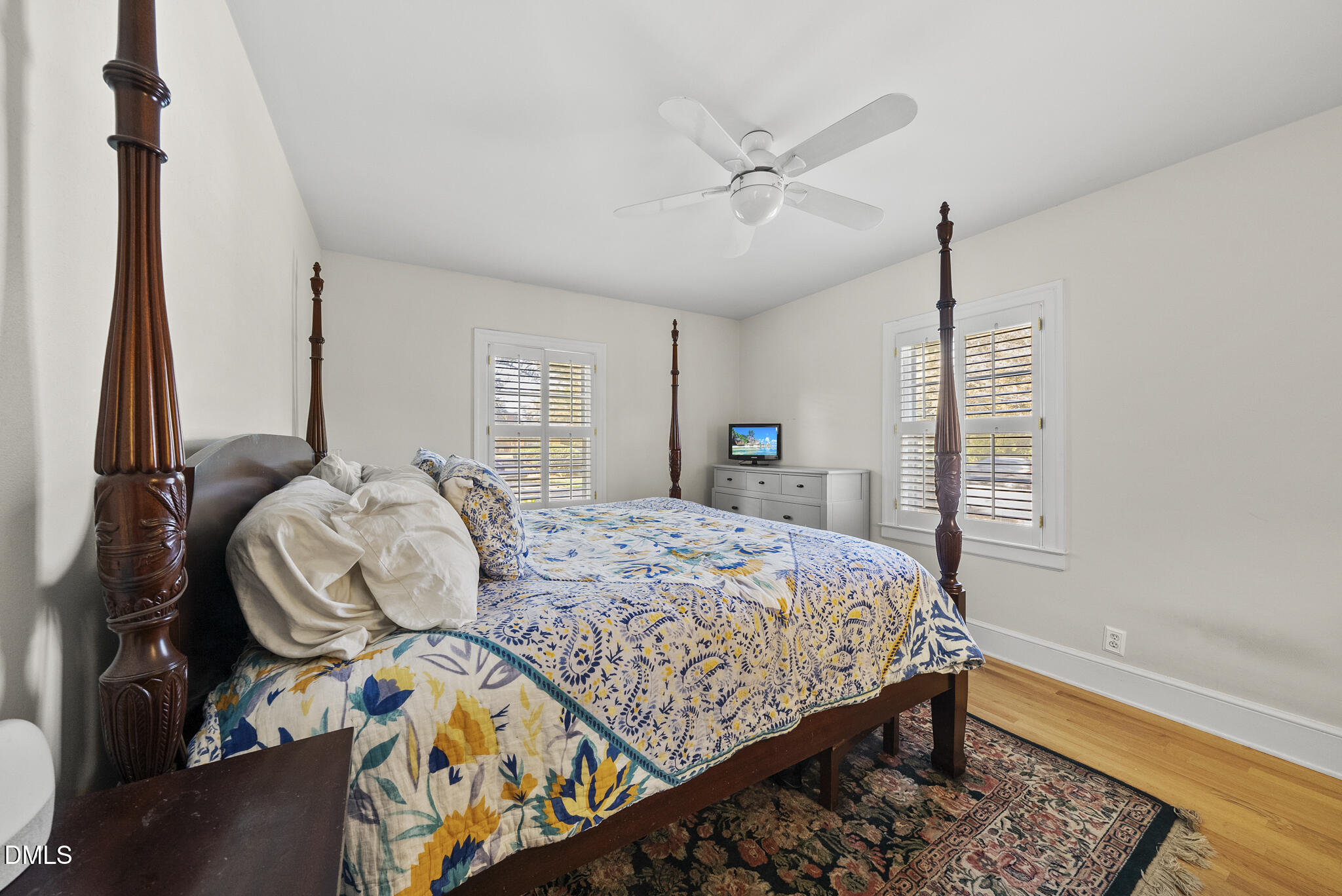 1108 Brooks Avenue Raleigh, NC 27607 - Photo 16 of 35 a bedroom with a bed dresser and a window