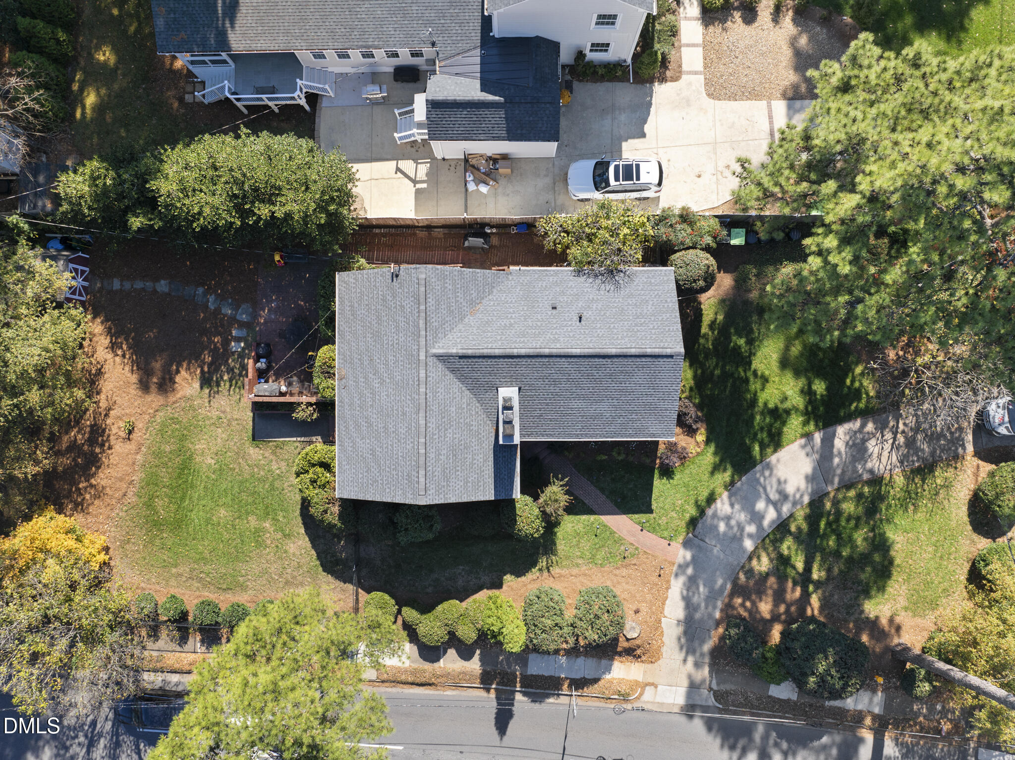 1108 Brooks Avenue Raleigh, NC 27607 - Photo 19 of 35 an aerial view of a house with a yard and lake view