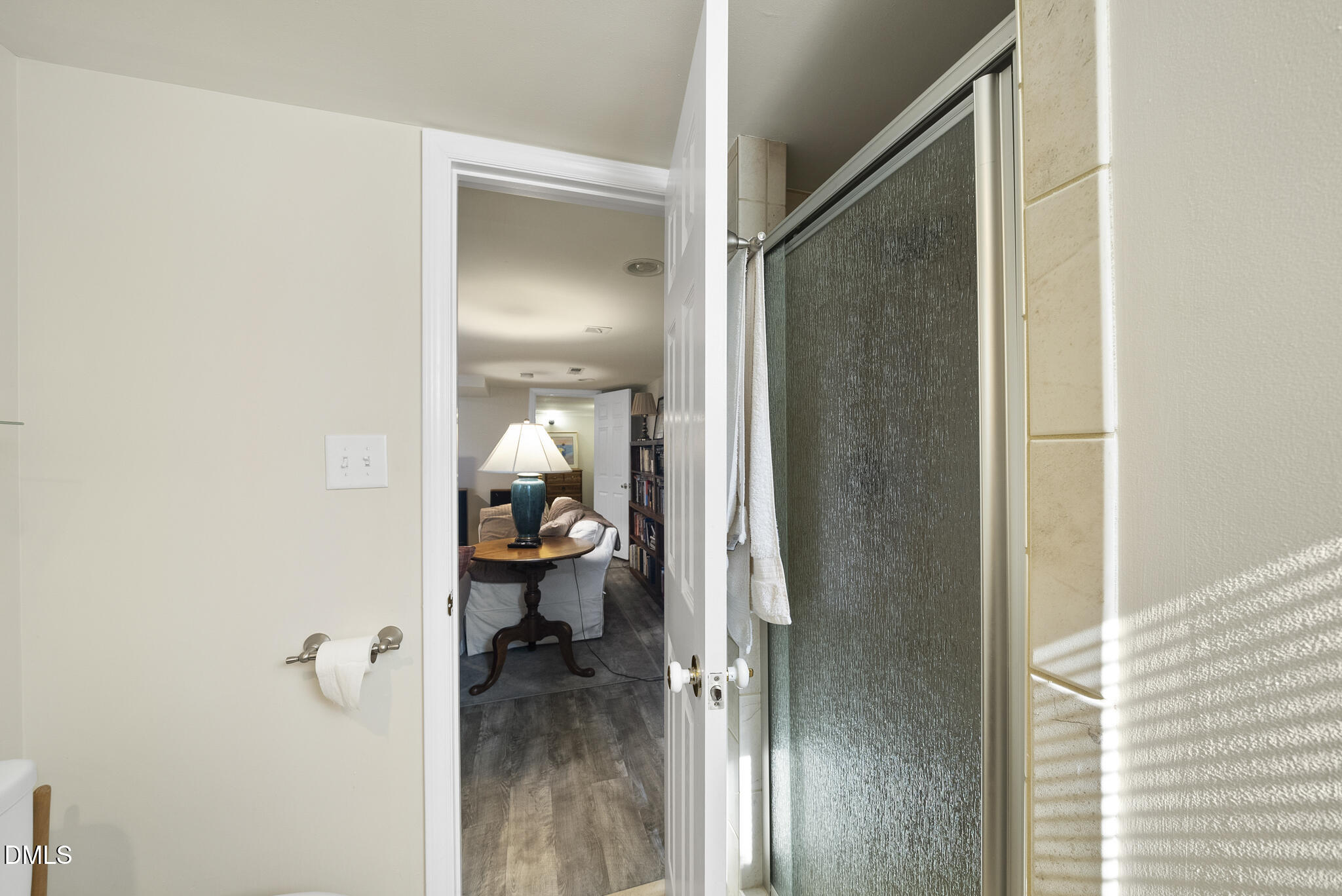 1108 Brooks Avenue Raleigh, NC 27607 - Photo 23 of 35 a bathroom with a glass shower door